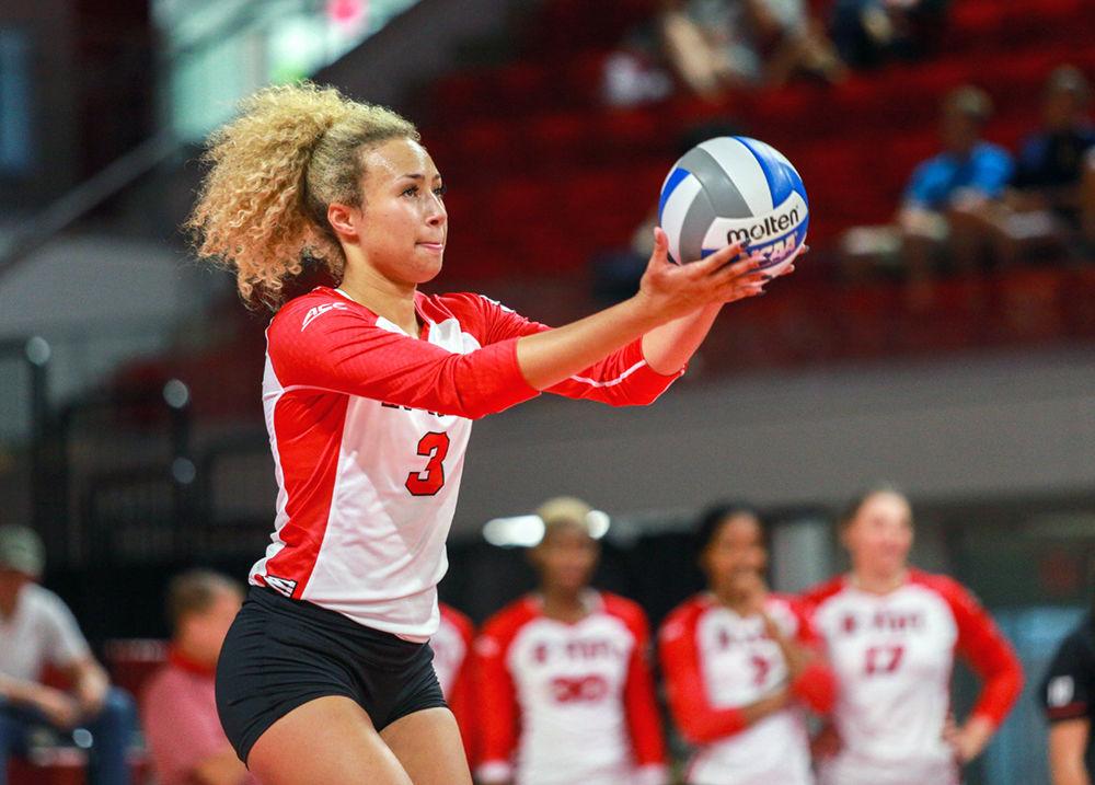 Sophomore opposite hitter Melissa Evans prepares a serve. Evans had one of the Pack's six aces to along with her team-high 12 kills in the 3-0 win over Campbell on Sunday, Sept. 9 in Reynolds Coliseum.