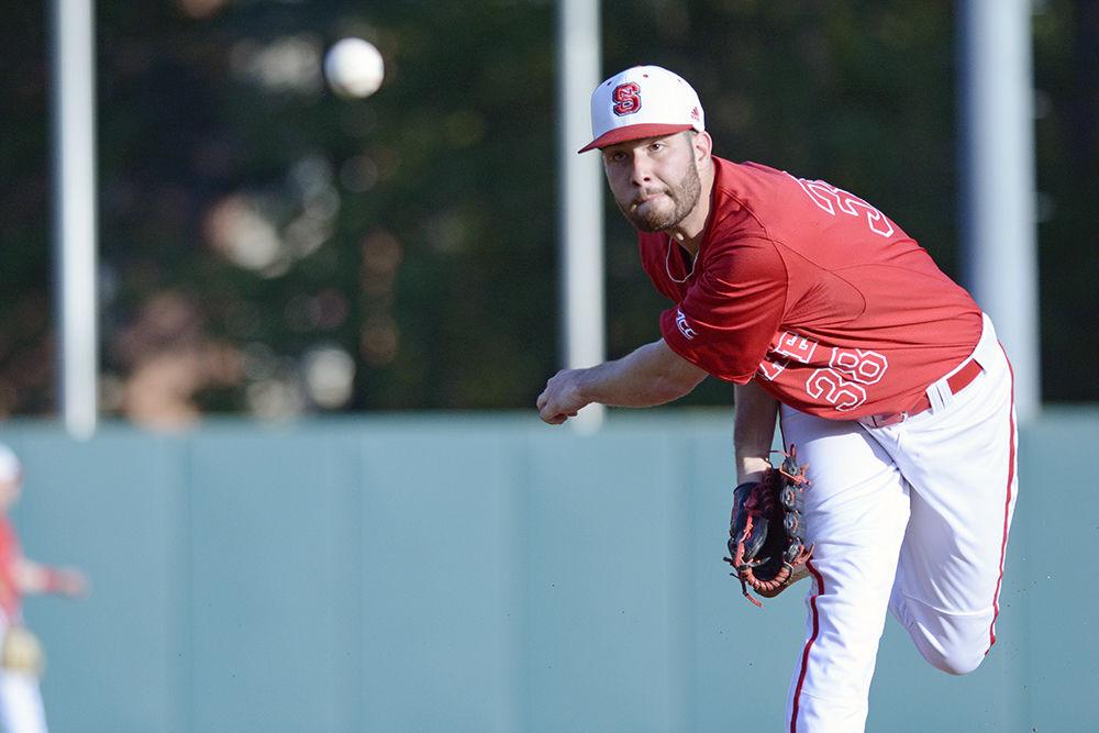 Senior pitcher Brian Brown warms up before facing UNC on Saturday, April 28 at Doak Field. Brown pitched 6.2 innings, gave up five hits and four earned runs and struck out four. Brown received his first loss of the season as UNC won 8-6.