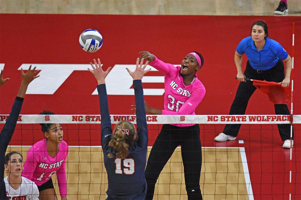Senior middle blocker Teni Sopitan attempts kill against the University of Virginia at Reynolds Coliseum on Friday, Oct. 12, 2018. The Wolfpack beat UVA 3-1. Sopitan had 15 kills and two digs.