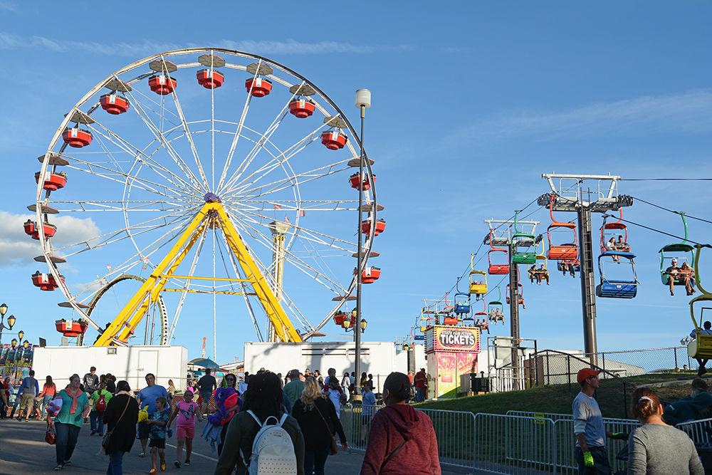 The Giant Parthenon Wheel was one of three Ferris Wheel-style rides at the 2018 NC State Fair. The State Fair Flyer is a ski lift-style ride that takes visitors across the fair. Over 120,000 people attended the fair on Saturday, Oct. 13.