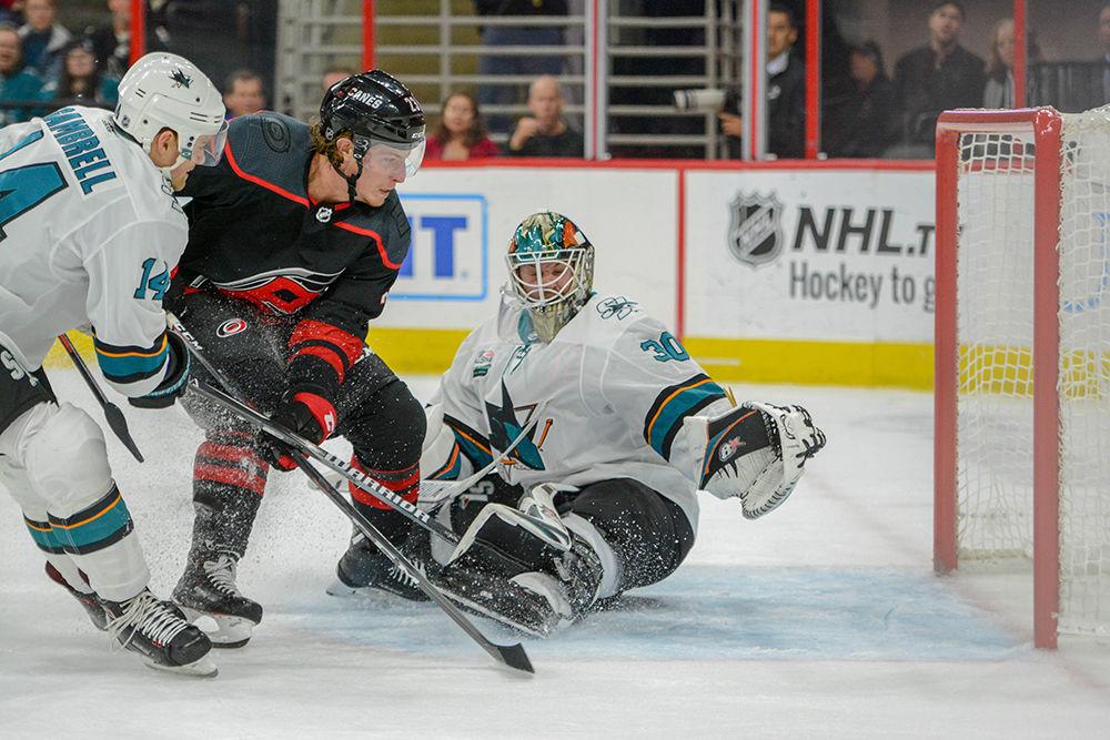 Carolina Hurricanes forward Brock McGinn scores his first goal of the 2018-2019 season against the San Jose Sharks on Friday, Oct. 26 in PNC Arena. The game went into a shootout, where McGinn scored again to give the Hurricanes their 4-3 victory.