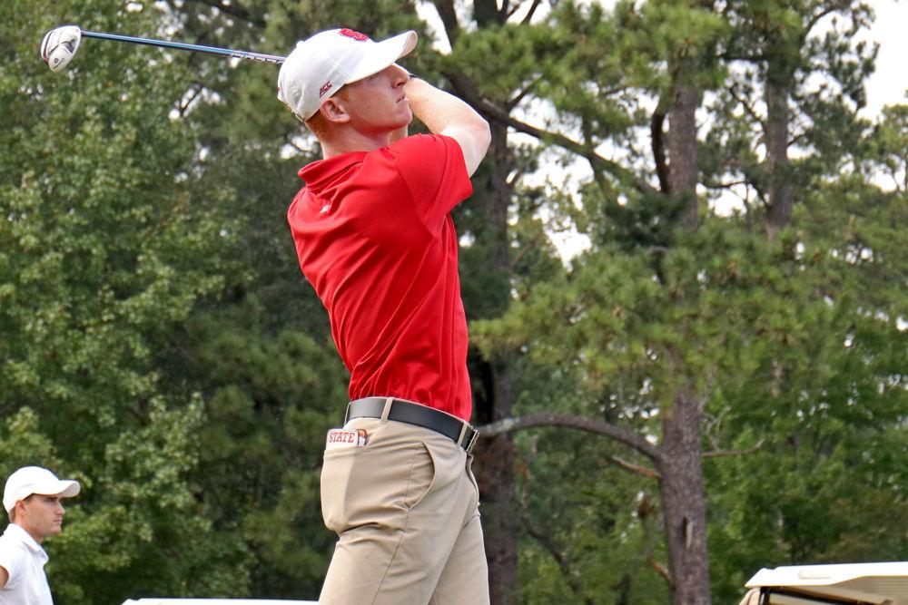 Senior Stephen Franken watches his drive on Saturday, Oct. 6 at Lonnie Poole Golf Course. Franken finished with a score of 3-under-par in the second round of the Wolfpack Intercollegiate.