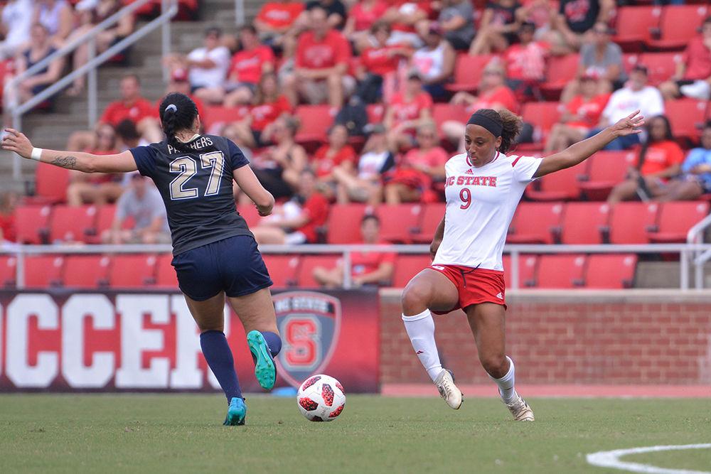 Senior forward Maxine Blackwood tries to steal the ball from a Pittsburgh defender on Sunday, Sept. 23 at Dail Soccer Field. The Wolfpack beat the Panthers 6-0.