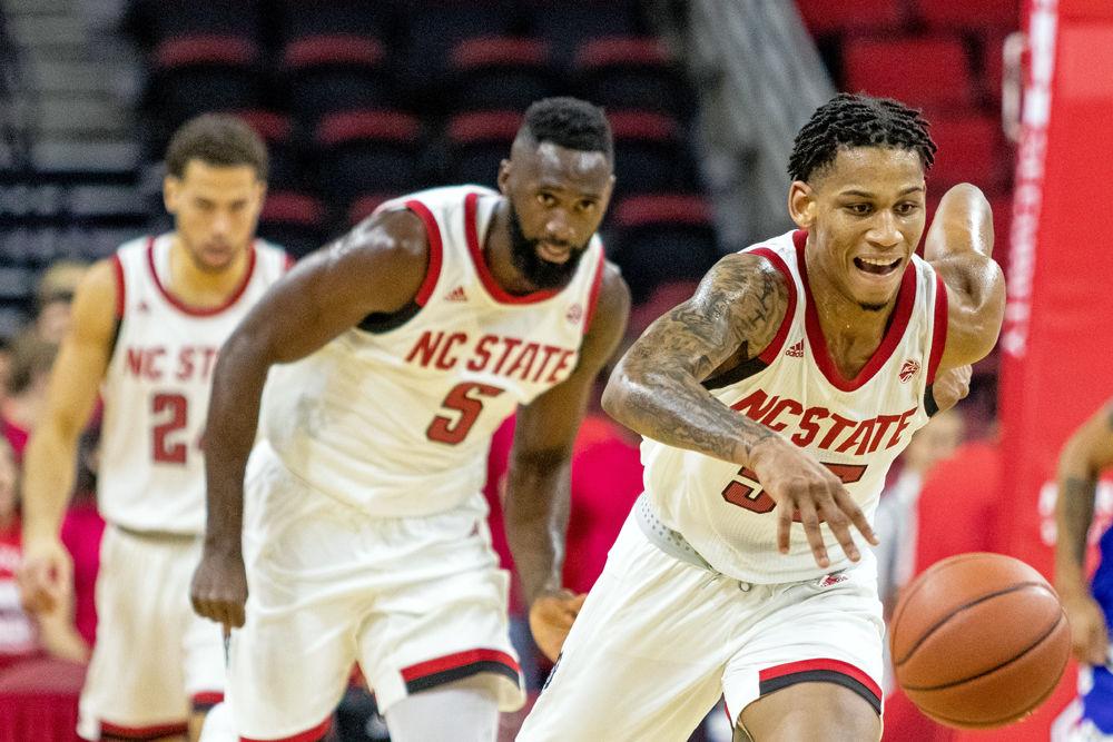 Sophomore guard Blake Harris drives downcourt after a rebound against Chowan in PNC Arena on Monday, Oct. 29. Harris recorded 9 points and five assists as the Wolfpack won 111-62.