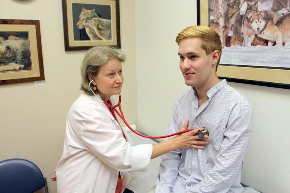 Campus physician creates wolf-inspired cross stitch art