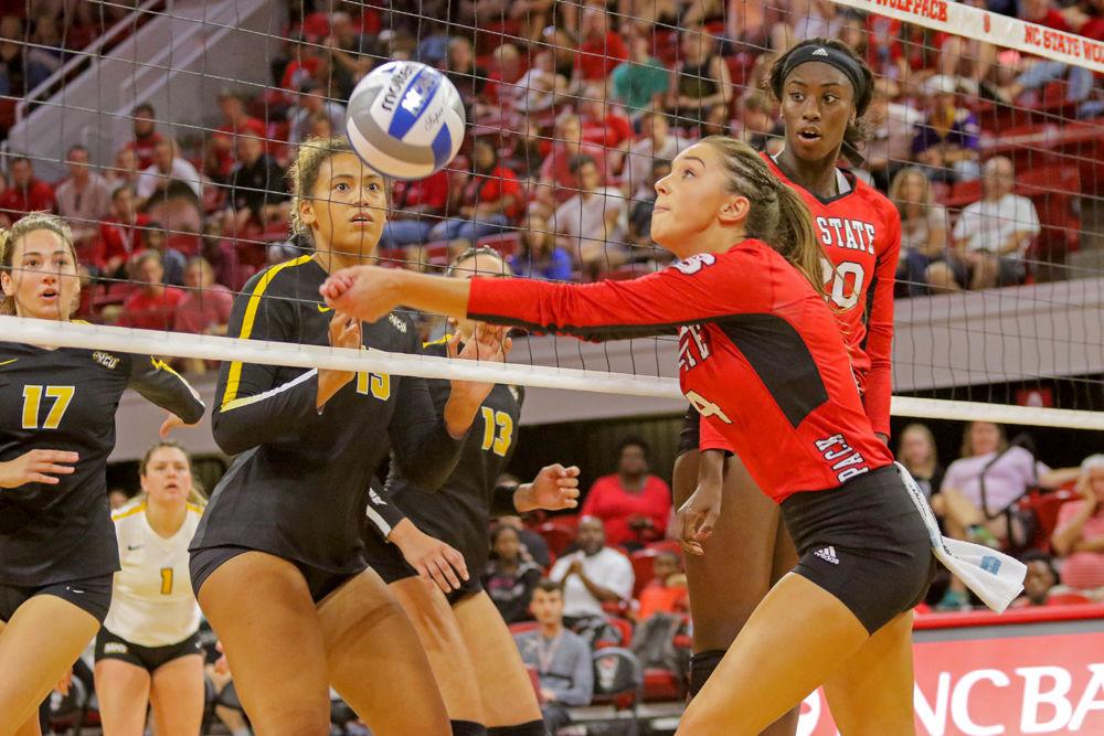 Senior setter Kylie Pickrell makes a pass on Friday, Aug. 24 in Reynolds Coliseum. The Wolfpack defeated Virgina Commonwealth University 3-2.