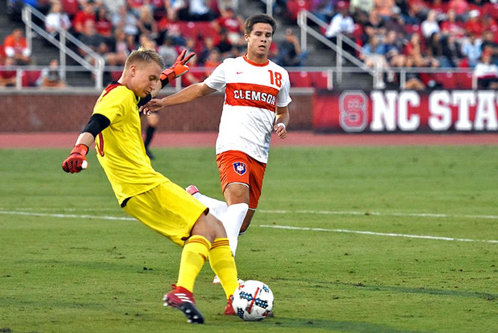Sophomore goalie Leon Krapf clears the ball against Clemson on Sept. 8, 2017 at Dail Soccer Field. The Wolfpack upset the top 5 ranked Tigers 1-0.