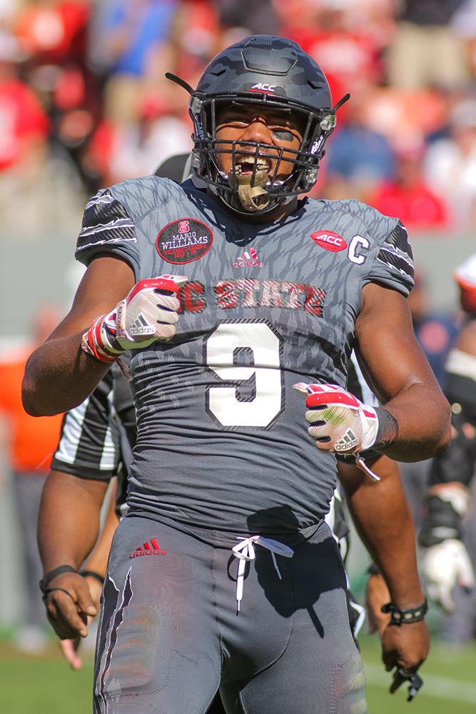 Senior defensive end Bradley Chubb gets fired up during the 33-25 win over Syracuse on Saturday, Sept. 30, 2017 in Carter-Finley Stadium.
