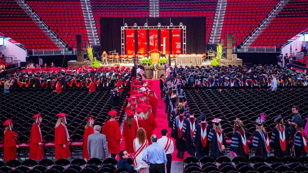 Students are escorted to their seats as part of the processional of the Spring Commencement on Saturday, May 12 in PNC Arena.