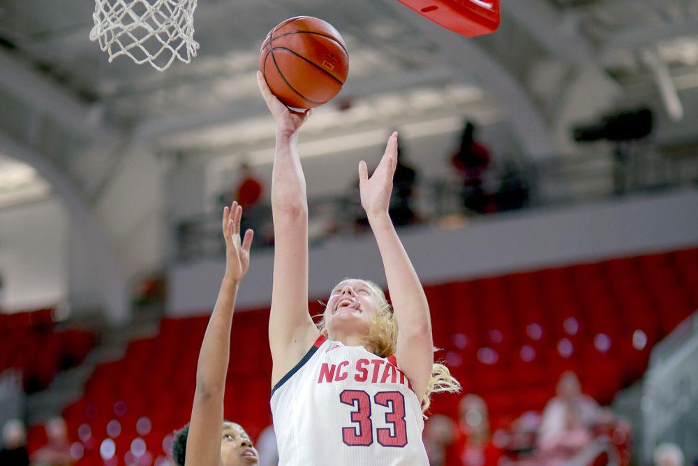 Freshman center Elissa Cunane makes a move past the defense to go in for a quick layup on Thursday, Nov. 1 in Reynolds Coliseum. Cunane recorded 12 points, three assists and four rebounds during the 83-57 exhibition win over Anderson University.