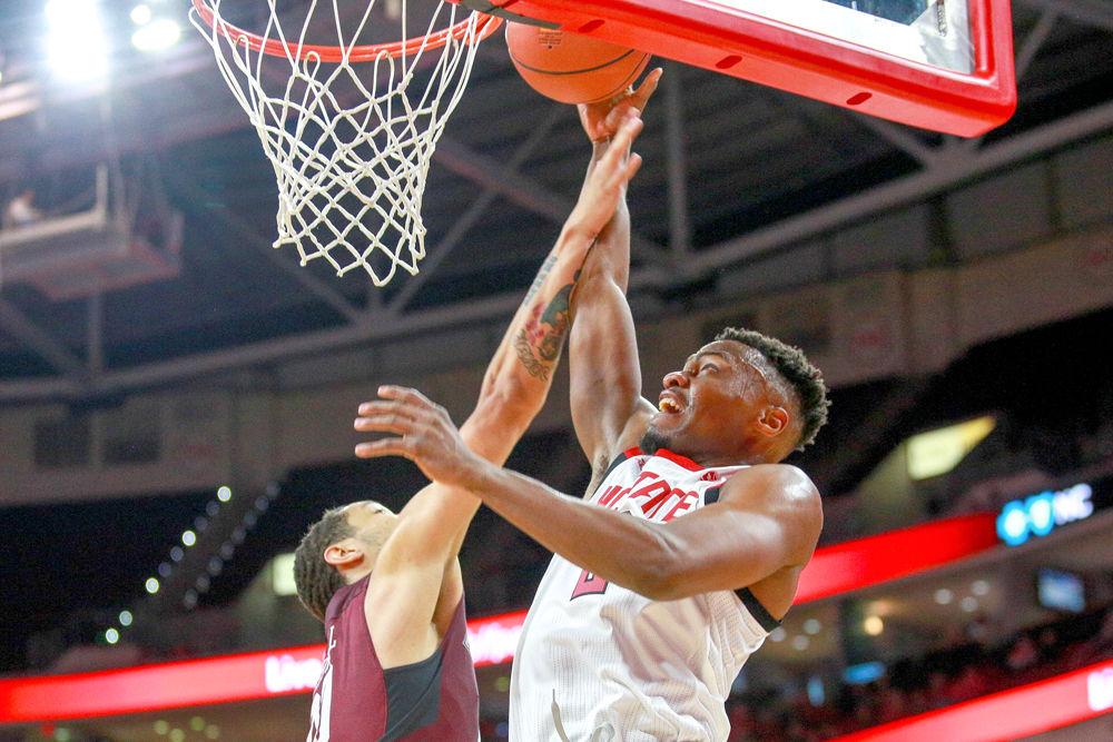 Redshirt senior guard Torin Dorn is fouled but makes the basket for a 3-point play on Saturday, Nov. 10 in PNC Arena. Dorn had a double-double with team highs of 22 points and 10 rebounds in 22 minutes of play. The Wolfpack took down Maryland Eastern Shore 95-49.