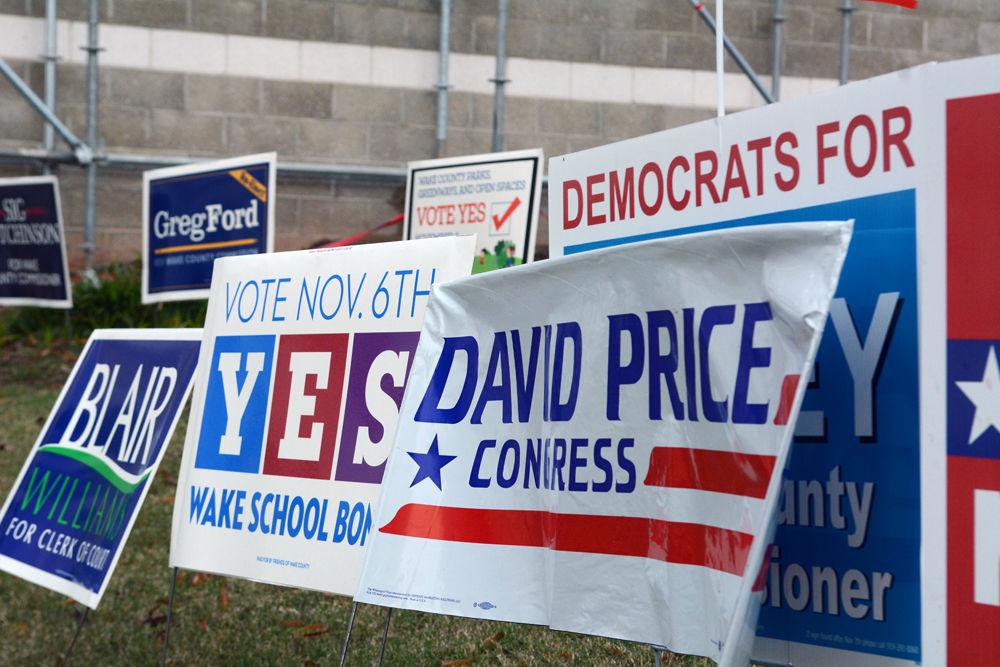Campaign signs for midterm elections&#160;stand on display outside of the Pullen Park Community Center on Tuesday, Nov. 6.