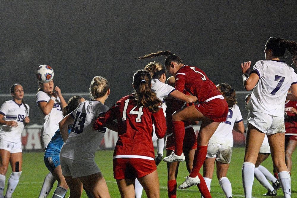 Freshman defender Jenna Butler heads the ball toward the goal against Northwestern on Friday, Nov. 9 at Dail Soccer Stadium. The Wolfpack beat the Wildcats 1-0 to advance to the next round of the NCAA Division I Women's Soccer Championship.