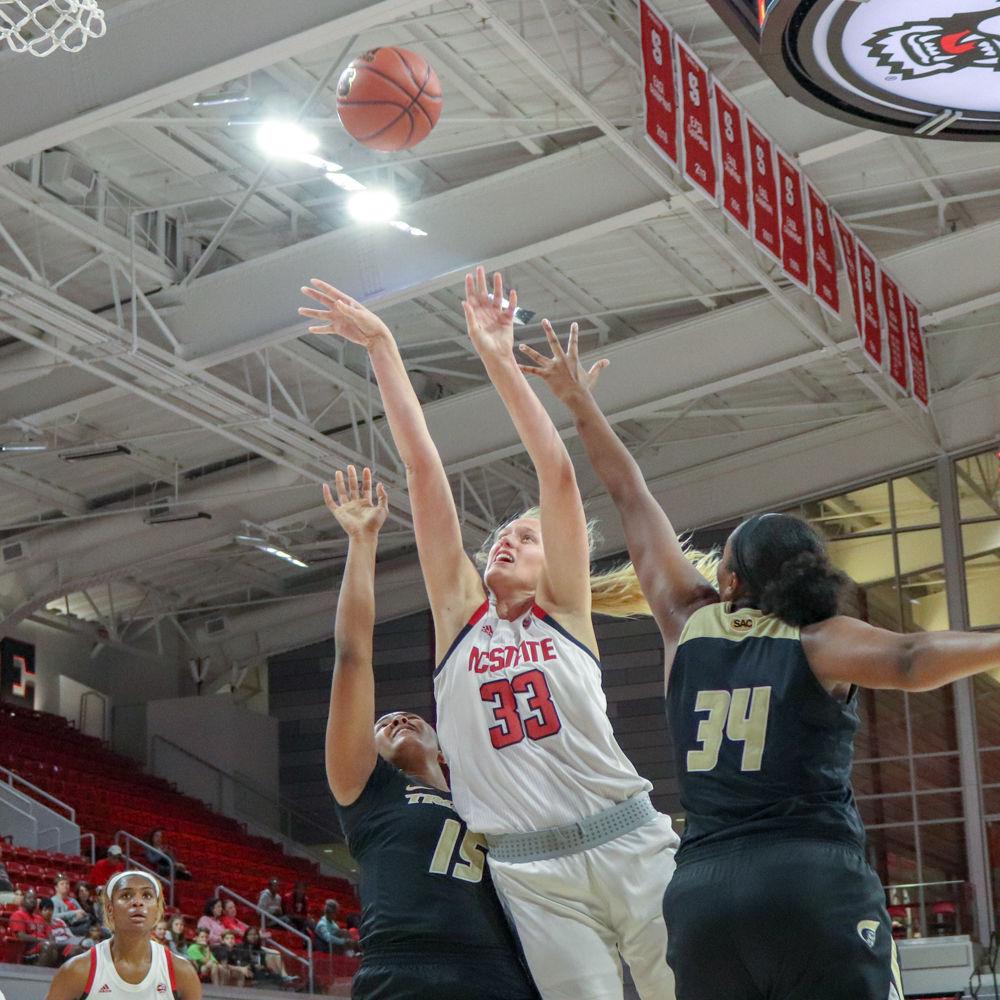 Freshman center Elissa Cunane struggles through the Anderson University defense in Reynolds Coliseum on Thursday, Nov. 1. Cunane scored 12 points as the Wolfpack won 83-57.