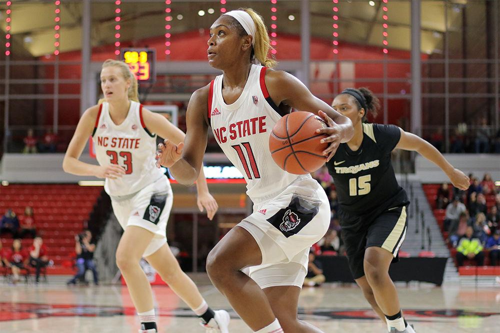 Graduate guard Kiara Leslie drives past the defense and goes up for a shot in transition. The Wolfpack struggled early but found their rhythm in the second half to cruise to an 83-57 win over Anderson University on Thursday, Nov. 1 in Reynolds Coliseum. Leslie had 10 rebounds and 7 points along with a stat in every major category.