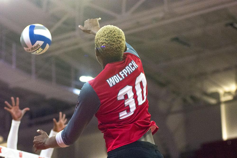 Senior middle blocker Teni Sopitan jumps up to hit the ball during the game against Notre Dame on Sunday, Sept. 23, 2018 at Reynolds Coliseum. The Wolfpack beat the Fighting Irish 3-1 for their first ACC win.