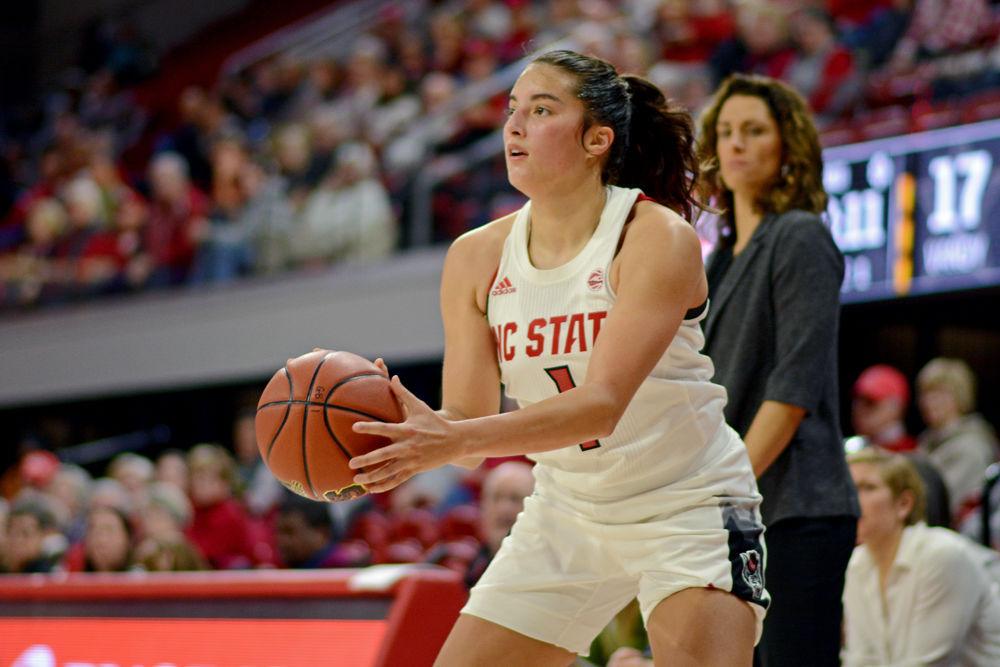 Junior guard Aislinn Konig prepares to pass the ball against Vanderbilt on Thursday, Nov. 15 at Reynolds Coliseum. Konig shot a team-high four 3-point shots on 10 attempts as the Wolfpack won 74-54.
