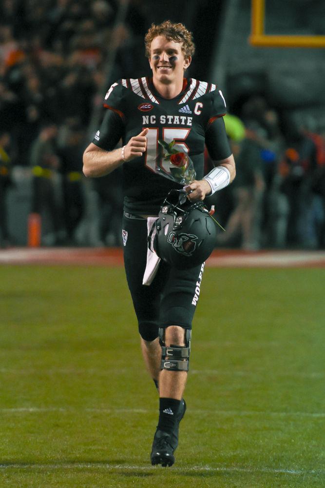 Graduate senior quarterback Ryan Finley runs out on senior night at the game against Wake Forest in Carter-Finley Stadium on Thursday, Nov. 8.&#160;NC State lost 27-23.