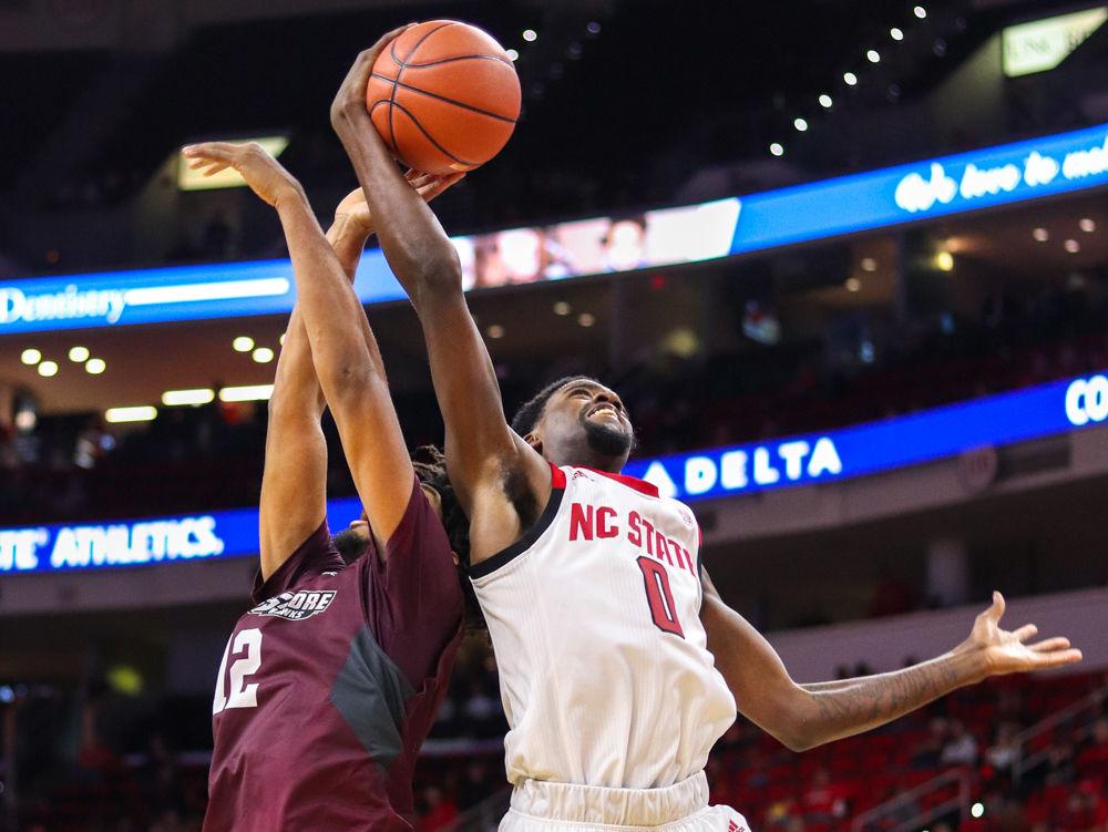 Redshirt sophomore forward DJ Funderburk grabs a defensive rebound on Saturday, Nov. 10 in PNC Arena. Funderburk recorded 13 points on 5-5 shooting along with five rebounds as the Wolfpack beat Maryland Eastern Shore 95-49.