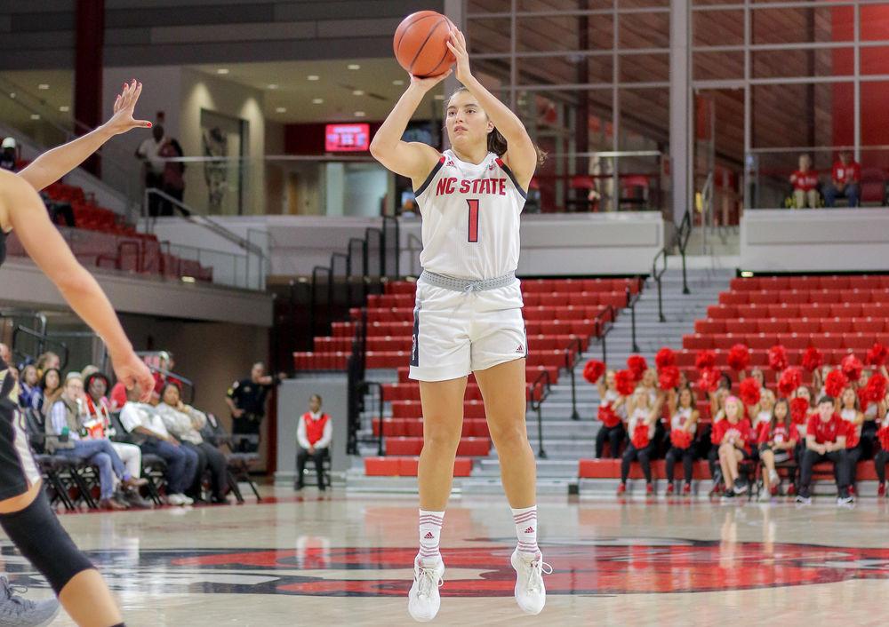 Junior guard Aislinn Konig shoots a 3-point shot on Thursday, Nov. 1 at Reynolds Coliseum. Konig recorded a team-high 14 points along with four assists during the exhibition against Anderson University, which the Wolfpack won 83-57.