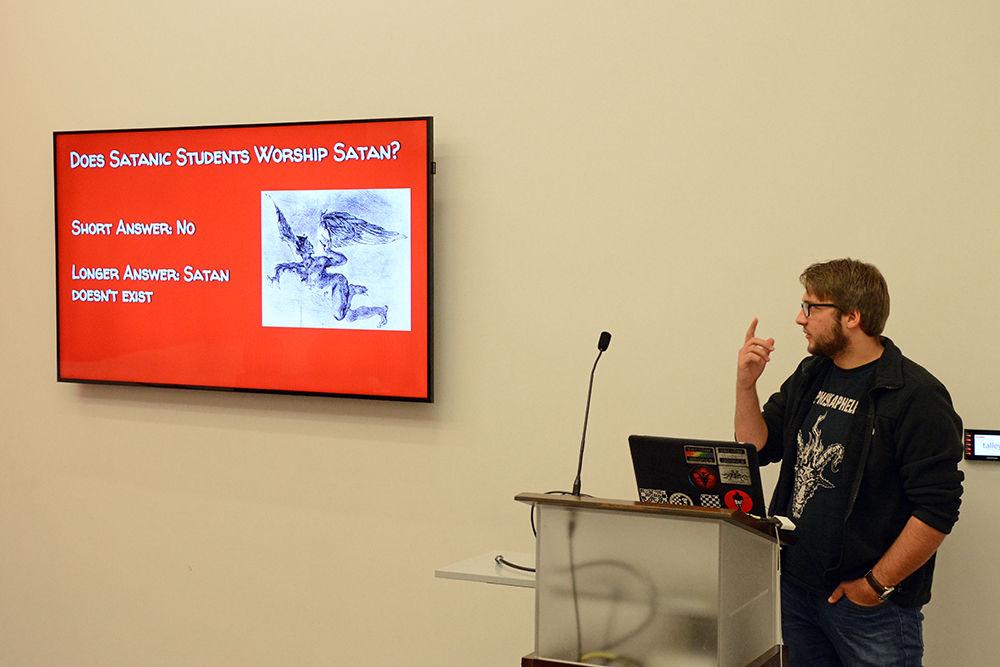 Peter Aker, a third-year studying chemical engineering and president of Satanic Students at NC State, speaks at the organization's meeting on Tuesday, Nov. 20 at Talley Student Union.