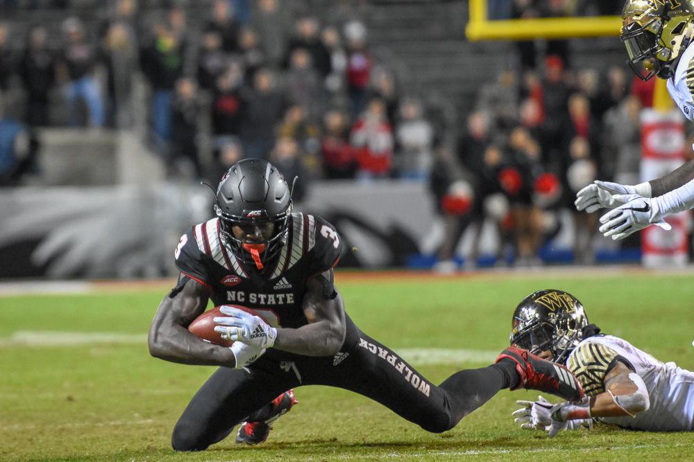 Junior wide receiver Kelvin Harmon catches a pass on Thursday, Nov. 8 in Carter-Finley Stadium. Harmon had 15 receptions for 134 yards against Wake Forest as NC State lost 27-23.