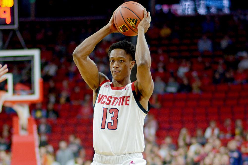 Redshirt junior guard C.J. Bryce, prepares to throw the ball against Maine on Saturday, Nov. 17 at PNC Arena. Bryce recorded 14 points, four assists and eight rebounds as the Wolfpack won 82-63.