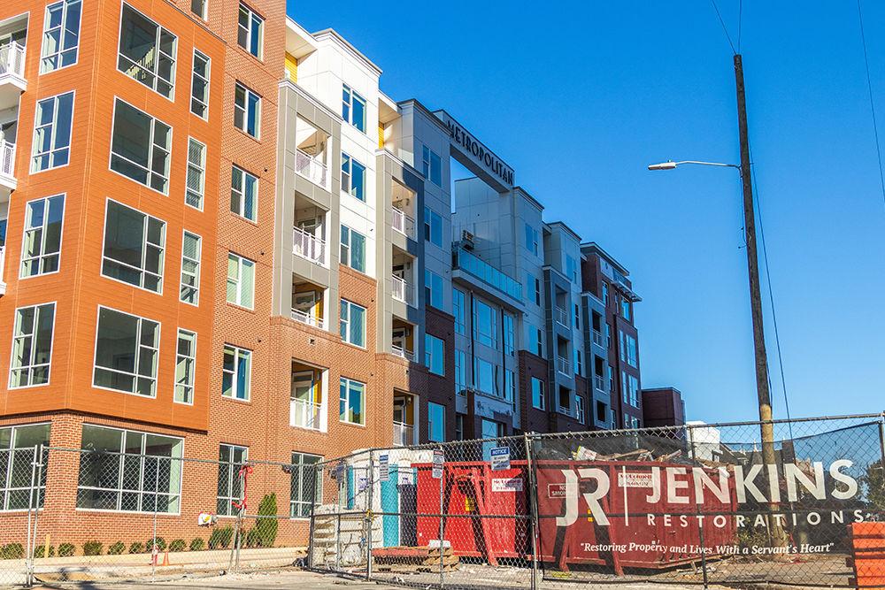 Construction happening outside The Metropolitan apartments on Saturday, Nov. 17, 2018. Metropolitan Apartments caught on fire last year on March 16.