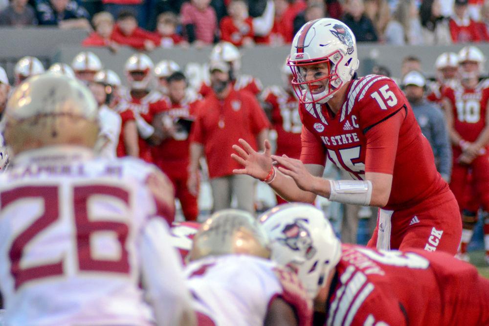 Graduate quarterback Ryan Finley prepares to catch a snap on Saturday, Nov. 3 at Carter-Finley Stadium. Finley completed 21 of 27 pass attempts for 240 yards and 3 touchdowns as the Wolfpack beat Florida State 47-28.