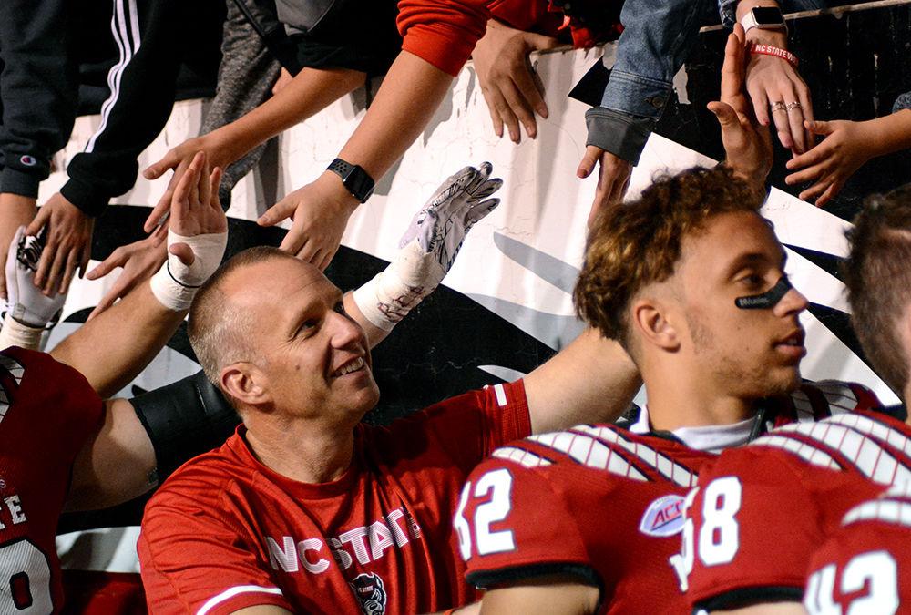 Head coach Dave Doeren thanks fans after the win against Florida State on Friday, Nov. 3 at Carter-Finley Stadium. The Wolfpack won 47-28.