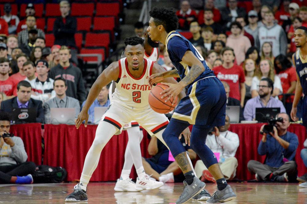 Redshirt senior guard Torin Dorn defends Mount St. Mary's guard Vado Morse on Tuesday, Nov. 6 at PNC Arena. Dorn scored game-highs of 28 points and nine rebounds as the Wolfpack won 105-55.