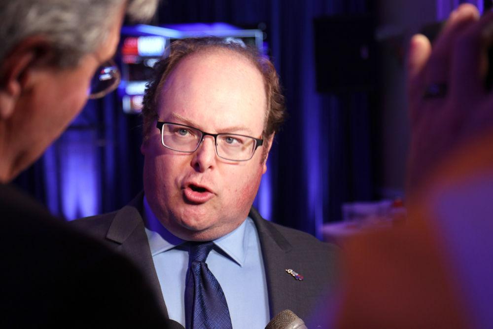 Wayne Goodwin, current chair of the North Carolina Democratic Party, speaks to news reporters at the Democratic midterm election watch party on Tuesday, Nov. 6 at the Goodwin House for NC Democrats. The Democratic election watch party was a gathering to watch the results of the polls.
