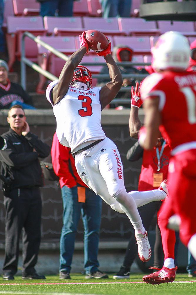 Junior wide receiver Kelvin Harmon goes up for the catch. Harmon had seven receptions for 100 yards during the 52-10 rout of Louisville on Saturday, Nov. 17 in Cardinal Stadium.