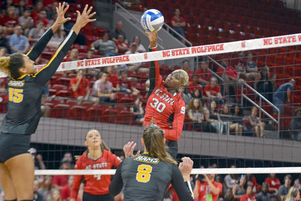 Senior middle blocker Teni Sopitan attacks Virginia Commonwealth University on Friday, August 24 at Reynolds Coliseum. The Wolfpack beat VCU 3-2 for their first win of the season.