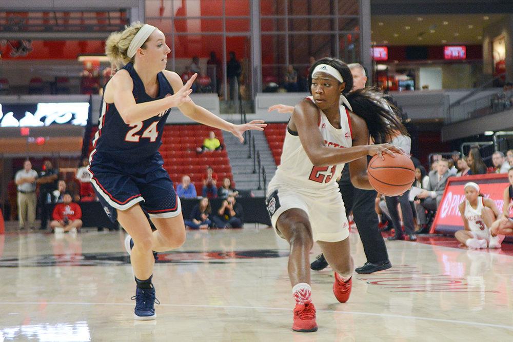 Redshirt junior guard Grace Hunter looks for a pass against Belmont on Wednesday, Nov. 7 at Reynolds Coliseum. Hunter scored a game-high 16 points on 8-11 shooting as the Wolfpack won 77-62.