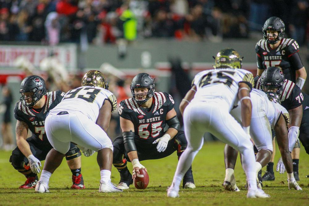 Graduate center Garrett Bradbury gets set during the 27-23 loss to Wake Forest on Thursday, Nov. 8 in Carter-Finley Stadium.