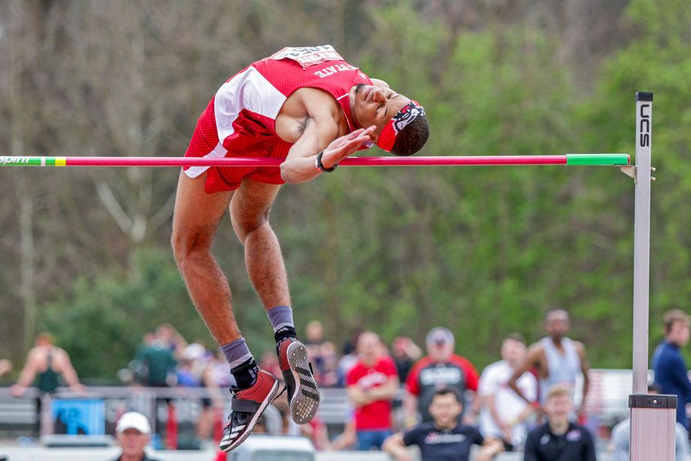 Sophomore JaTory Reid begins crossing over the bar in the high jump. Reid was able to win second with a 2.05m in the Raleigh Relays on Friday, March 30 at the Paul Derr Track and Field Facility.