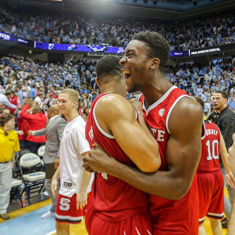 Senior forward Abdul-Malik Abu gives out an exhilarated shout as he hugs graduate transfer guard Allerik Freeman as the clock hits zero for a 95-91 overtime thriller against UNC at the Smith Center on Saturday, Jan. 27.