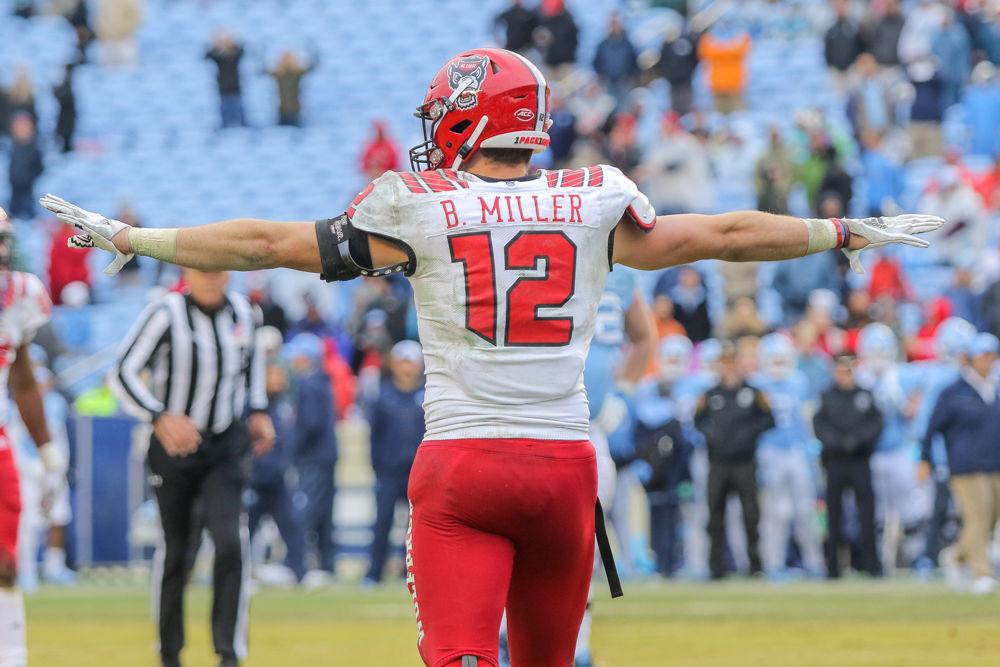 Redshirt sophomore linebacker Brock Miller signals that the field goal is no good after the miss by UNC to start overtime. The Wolfpack were tested by the Tar Heels, but came away with a 34-28 win on Saturday, Nov. 24 in Kenan Memorial Stadium.