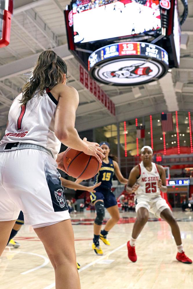 Junior guard Aislinn Konig looks to inbound the ball to sophomore forward Kayla Jones in Reynolds Coliseum on Thursday, Nov. 29. Konig recorded 6 points and six assists, while Jones had 5 points and seven rebounds as the Wolfpack won 66-55.
