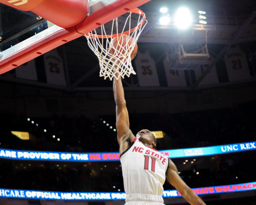 Junior guard Markell Johnson attacks the rim against No. 7 Auburn on Wednesday, Dec. 19 at PNC Arena. Johnson recorded a career-high 27 points on 9-of-15 shooting in the Wolfpack&#8217;s 78-71 win.