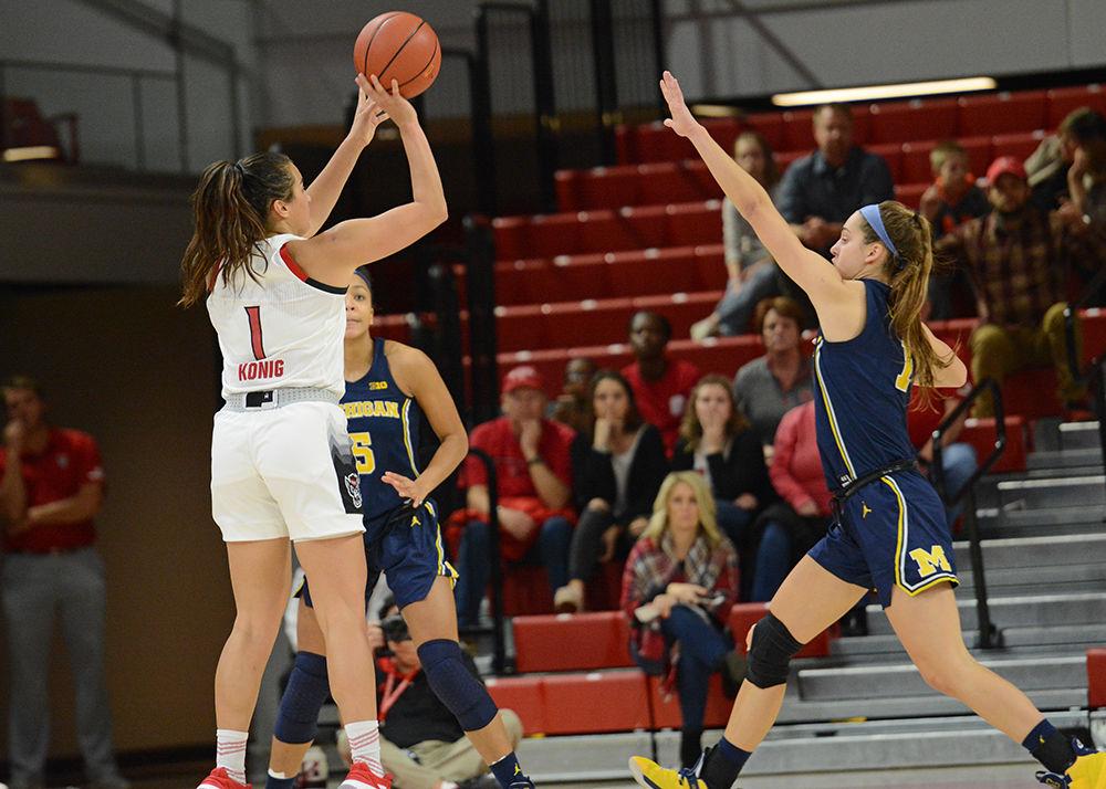 Junior guard Aislinn Konig shoots against Michigan on Thursday, Nov. 29 at Reynolds Coliseum. Konig recorded six points and six assists as the Wolfpack won 66-55.