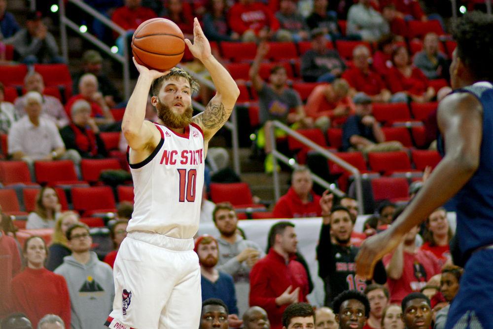 Sophomore guard Braxton Beverly takes a shot against Saint Peter&#8217;s on Tuesday, Nov. 20 at PNC Arena. Beverly scored 10 points as the Wolfpack won 85-57.