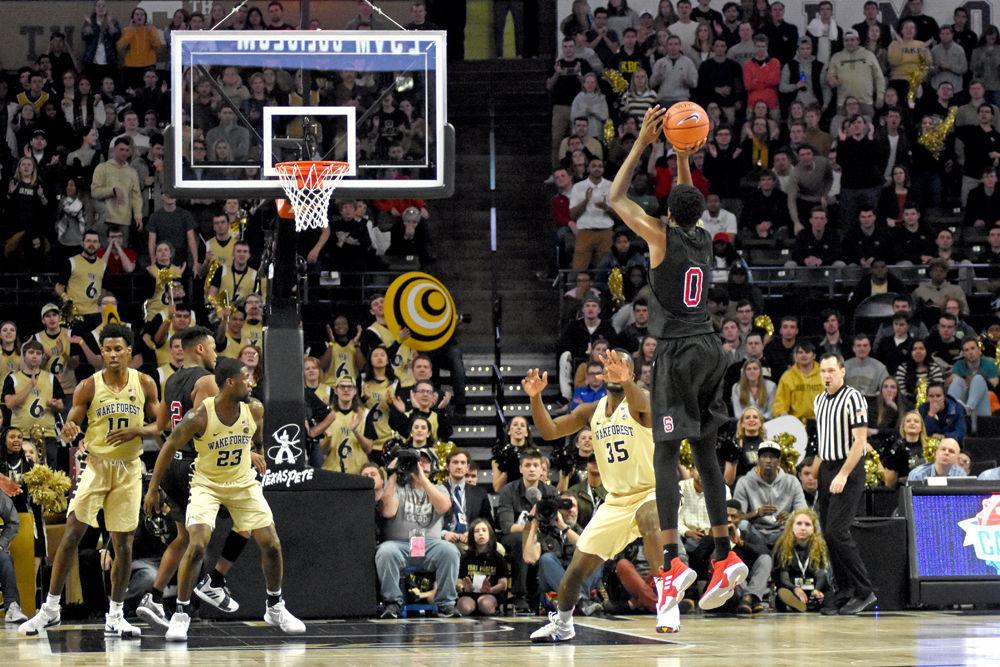 Redshirt sophomore DJ Funderburk shoots the ball during the game against Wake Forest on Tuesday, Jan. 15 in Lawrence Joel Veterans Memorial Coliseum. Despite coming back from a 22-point hole, the Wolfpack still ended up losing to the Demon Deacons 71-67.