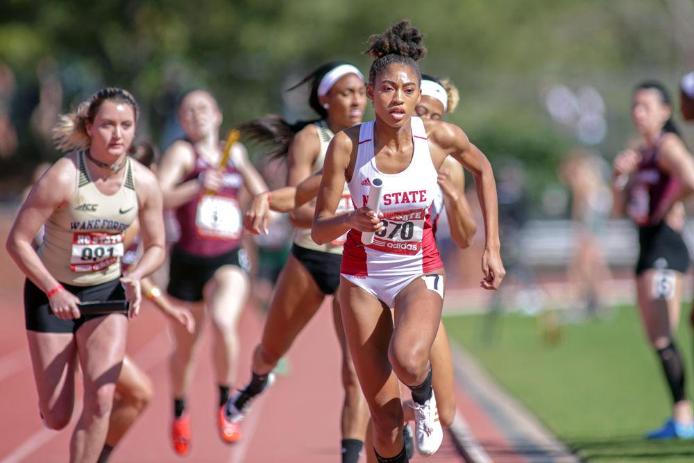 Freshman Jada Griffin begins the third les of the Women's 4x400m. NC State took second with a 3:42.90 the second best outdoor performance in school history in the Raleigh Relays on Saturday, March 31 at the Paul Derr Track and Field Facility.