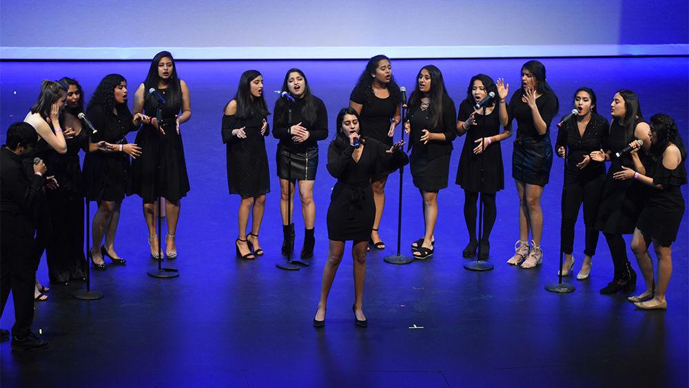 UNC Samaa, a co-ed a cappella group from UNC Chapel Hill, performs a pop song in combination with Indian music during Navarasa, held in Stewart Theatre on Saturday, Jan. 26, 2019. Navarasa is an Indian classical dance competition hosted by NC State University.