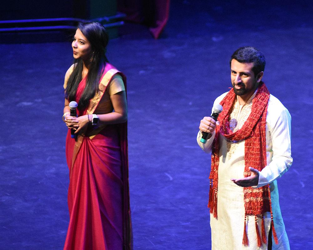 Pranathi Sana and Atif Mahmood, NC State students and the co-directors of Navarasa 2019, take the stage at the start of the show in Stewart Theatre on Saturday, Jan. 26. Navarasa is an annual intercollegiate Indian classical dance competition hosted by NC State.