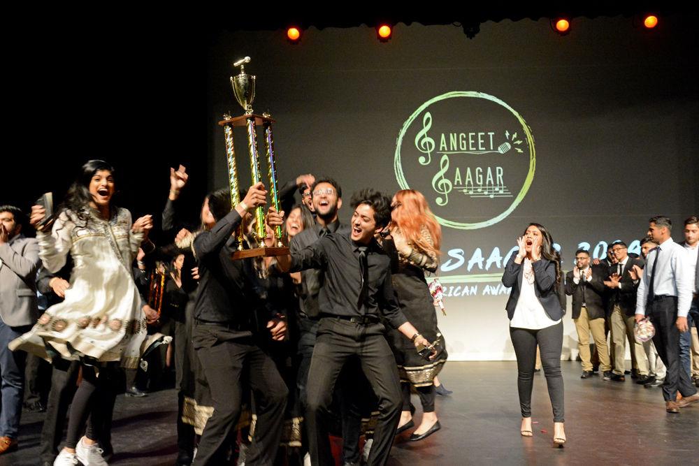 Hum A Cappella, an a cappella group from UT Austin, celebrates winning first place in Sangeet Saagar 2019 on Saturday, Jan. 19 at Stewart Theatre. Sangeet Saagar is a South Asian acappella competition with teams from different schools across the country.