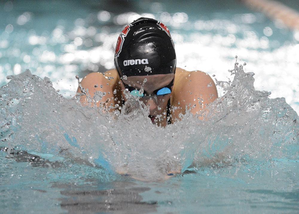 Sophomore Anna Shumate competes in the 100-yard breaststroke on Saturday, Jan. 19, 2019 at Casey Aquatic Center. The NC State women's swimming and diving team beat UNC-Chapel Hill 193-101. Shumate repeated placed in the top in each of her events.