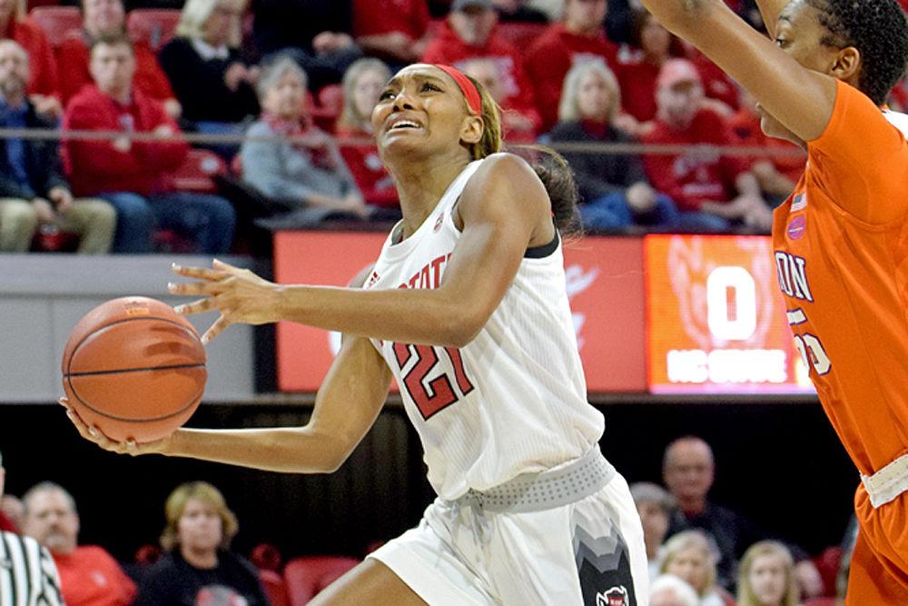 Senior forward DD Rogers goes up for a layup against Clemson on Thursday, Jan. 24 in Reynolds Coliseum. Rogers totaled 11 points to contribute to the 54-51 win over the Tigers.